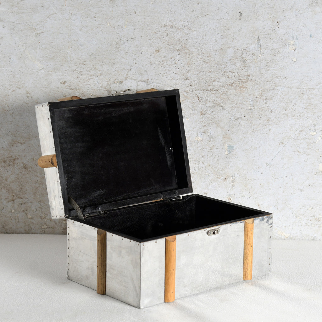 An open galvanized MDF & metal storage chest with a black lined interior.