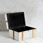 An open galvanized MDF & metal storage chest with a black lined interior.