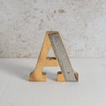 Decorative letter 'A' with textured metal finish