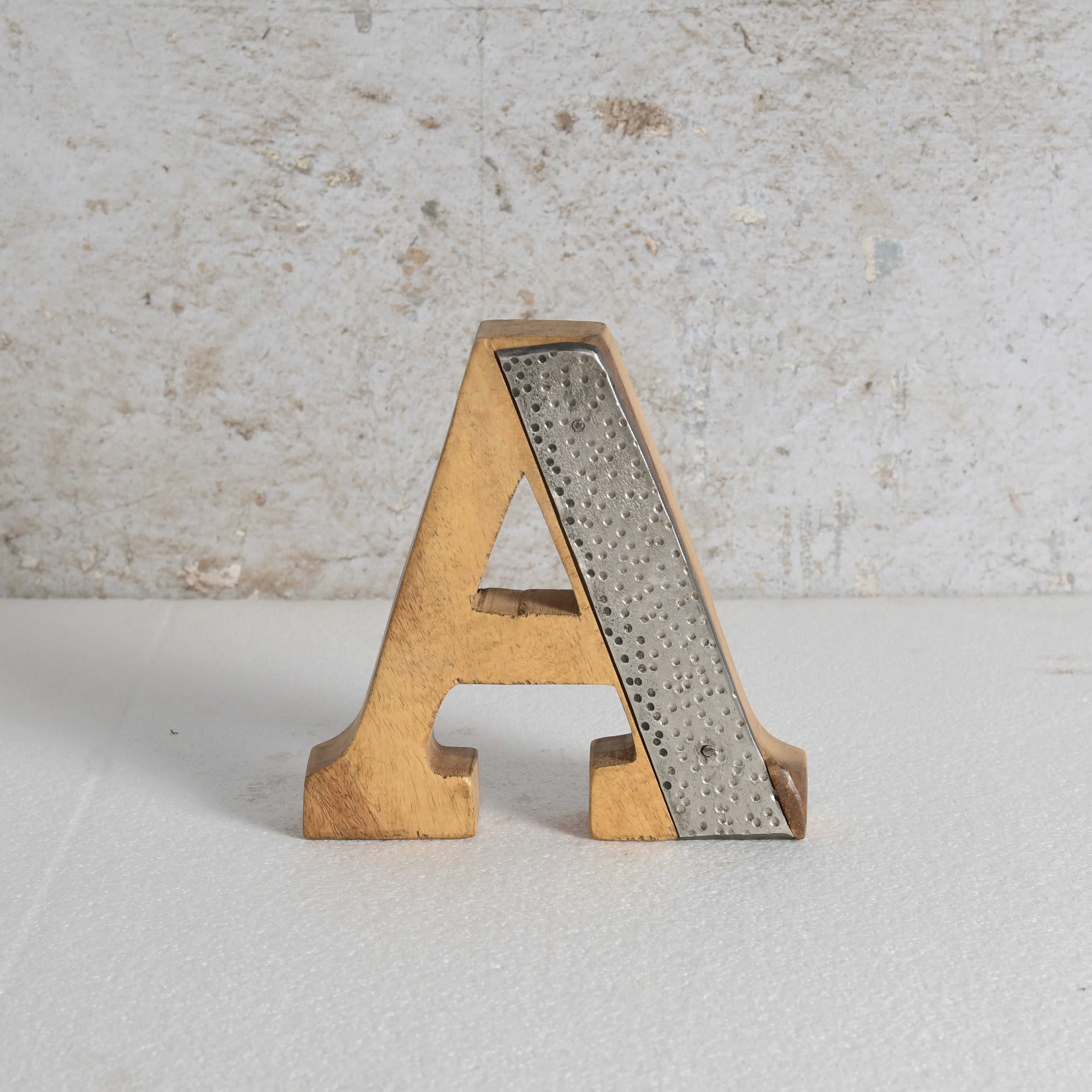 Decorative letter 'A' with textured metal finish