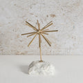 Gold starburst decor with white tone base