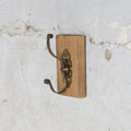 Wooden wall hook with metal brackets