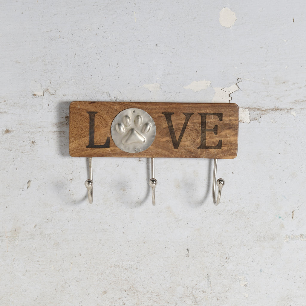 Wooden wall hook with LOVE and par impression.