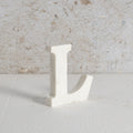 White marble letter L