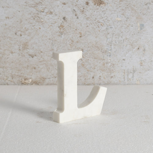 White marble letter L