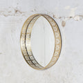 Iron wall mirror, could be used as tray also.