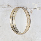 Iron wall mirror, could be used as tray also.